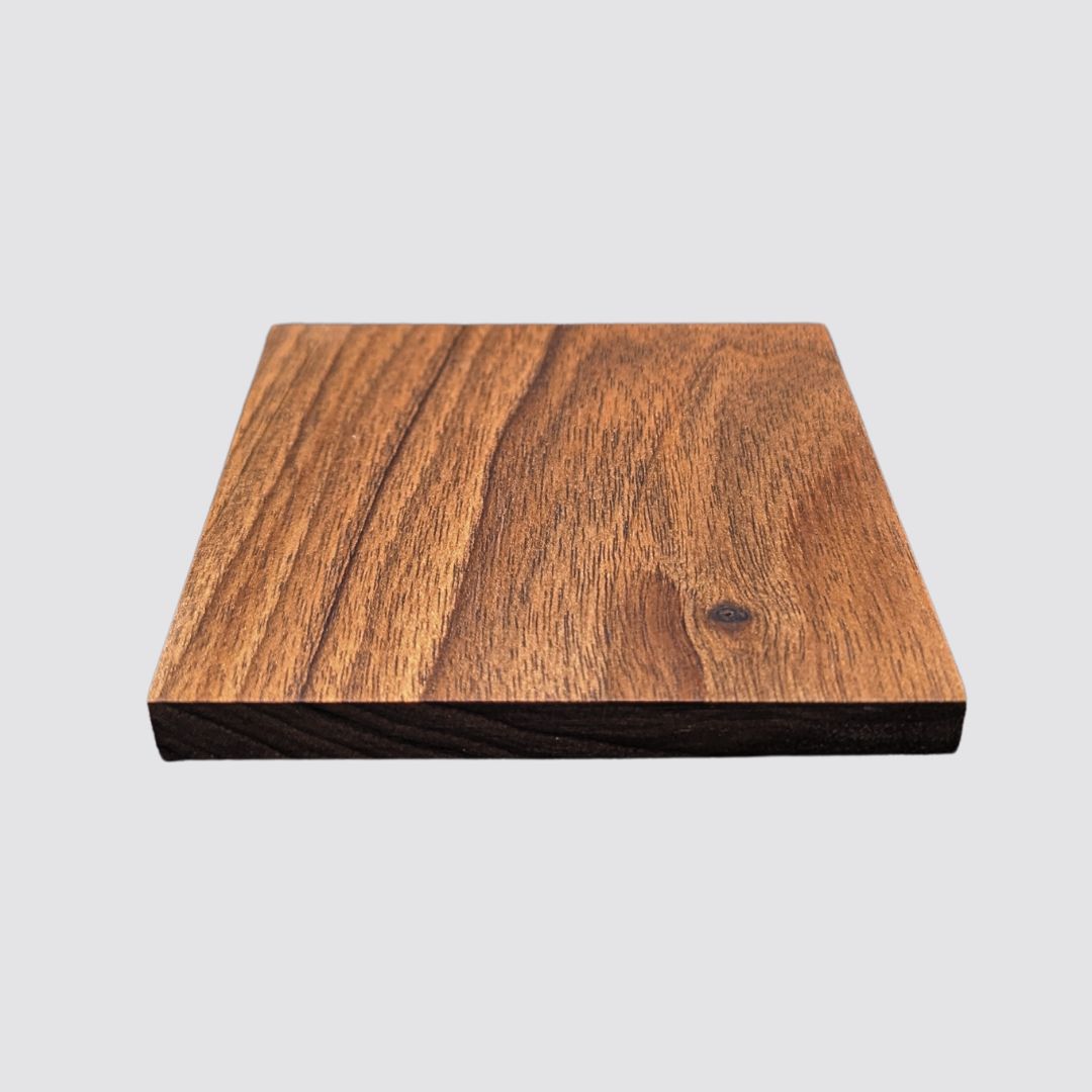 The drink coaster is made of luxuriously crafted walnut wood.