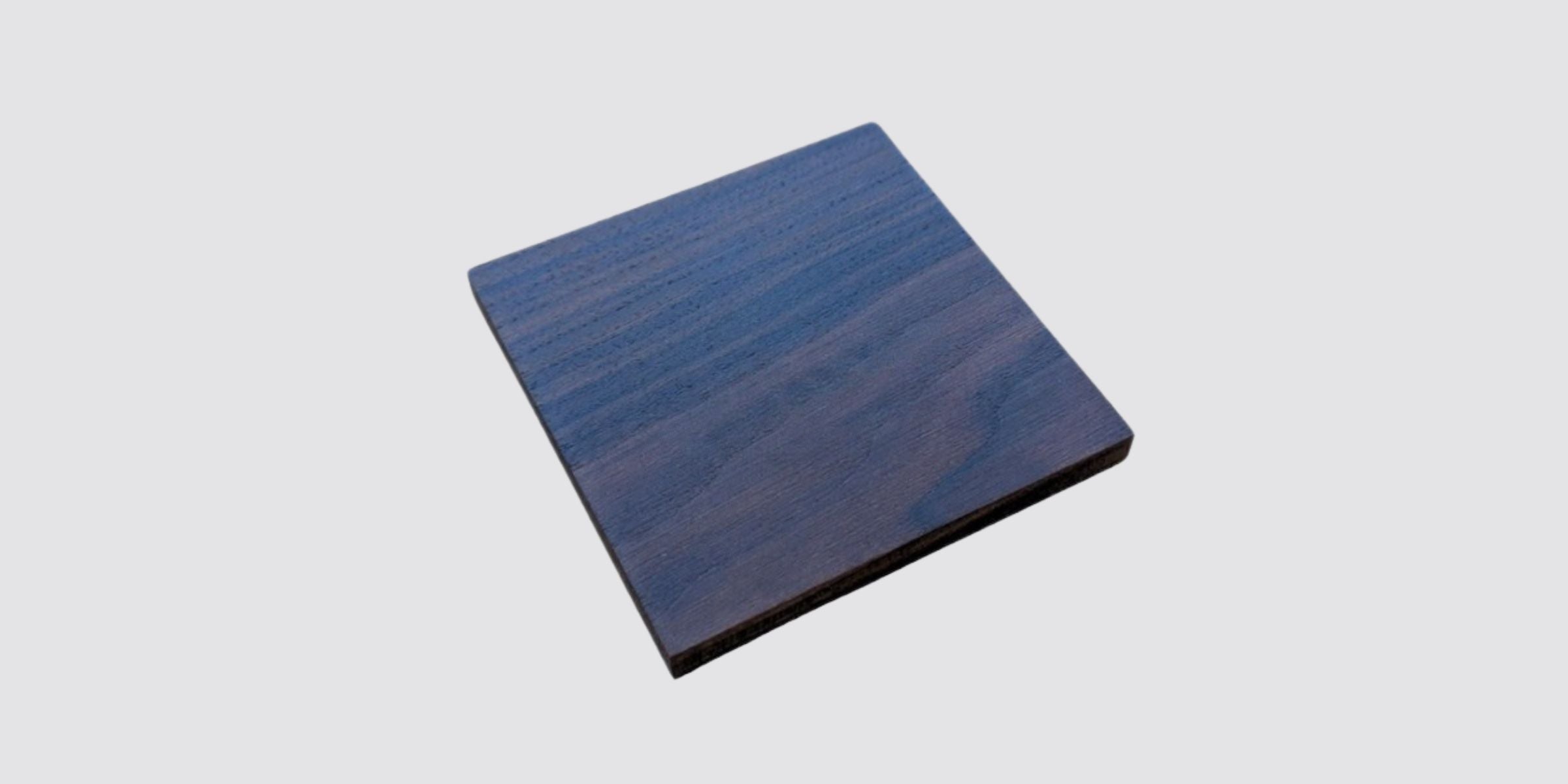 wooden coaster engraved with Six Senses logo