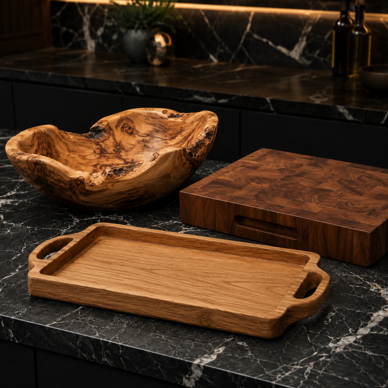 Amenities from Olive, Oak and Walnut Wood on a luxurious marble kitchen countertop