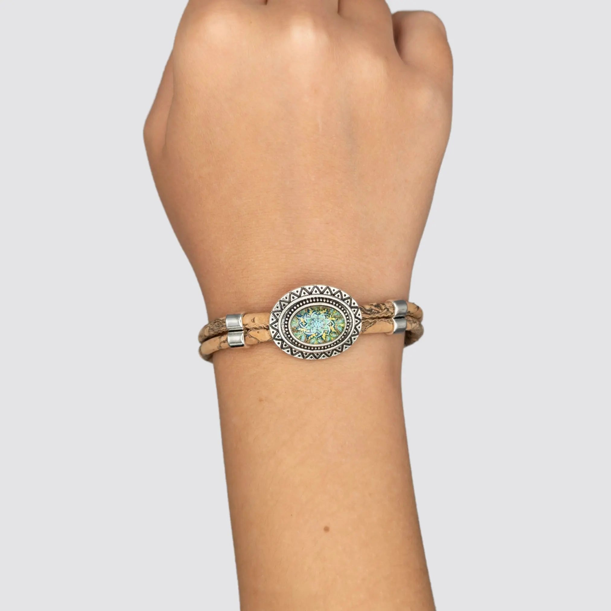 Handcrafted women’s cork bracelet with a meaningful Portuguese heritage charm.