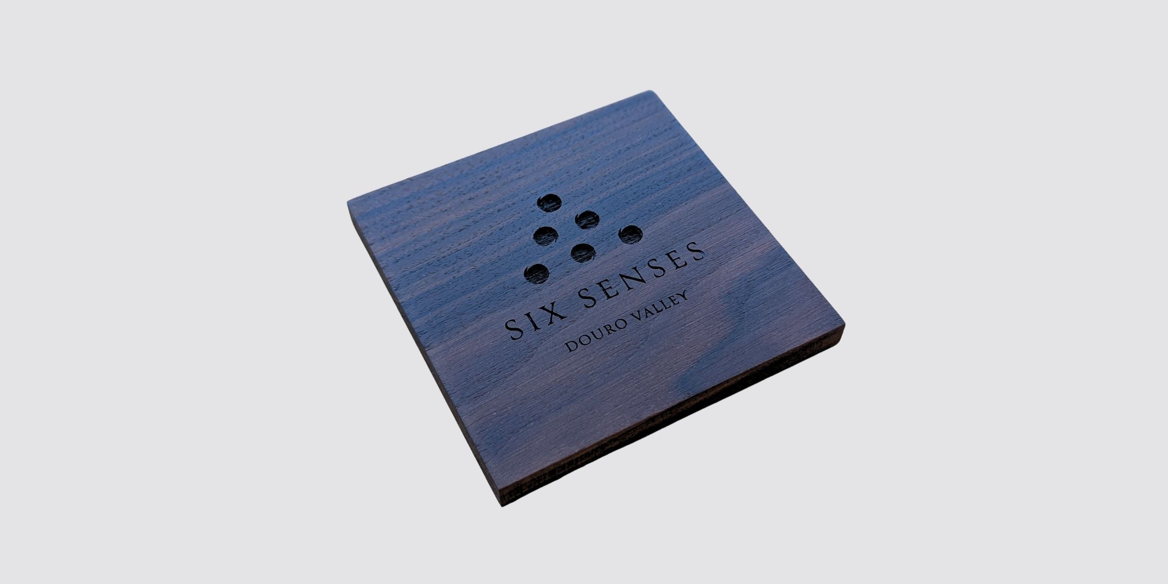 wooden coaster laser engraved with logo of hotel